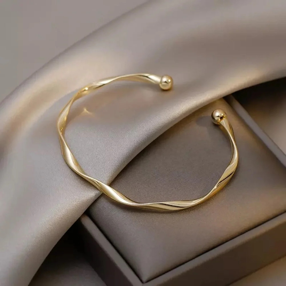 “Anya” Minimalist Twist Open Adjustable Gold Neutral Fashion Simple Bracelet - Picture 1 of 9